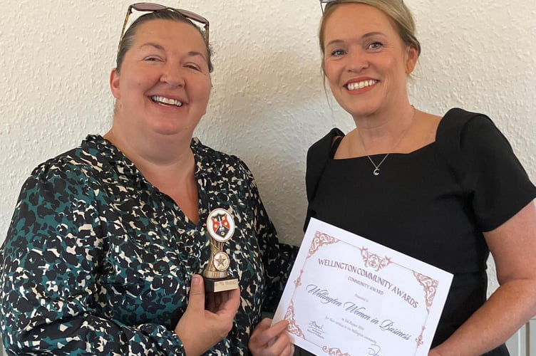 Maz Vincent (left) and Zoe Old receive the Community Award. (Photo: Wellington Town Council).
